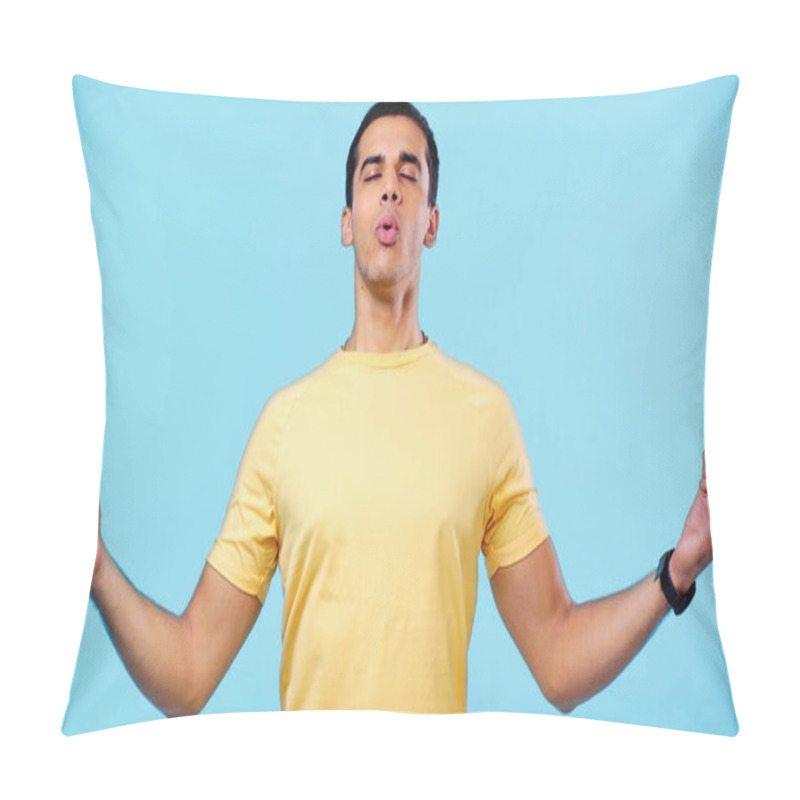 Personality  Young Man With Closed Eyes In Yellow T-shirt Meditating While Breathing Isolated On Blue Pillow Covers