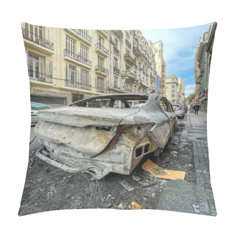 Personality  A Burnt Car On A Buenos Aires Sidewalk Amidst Urban Buildings, With Trash And Debris Scattered On The Street, Highlighting Urban Decay In The City's Residential Areas. Pillow Covers