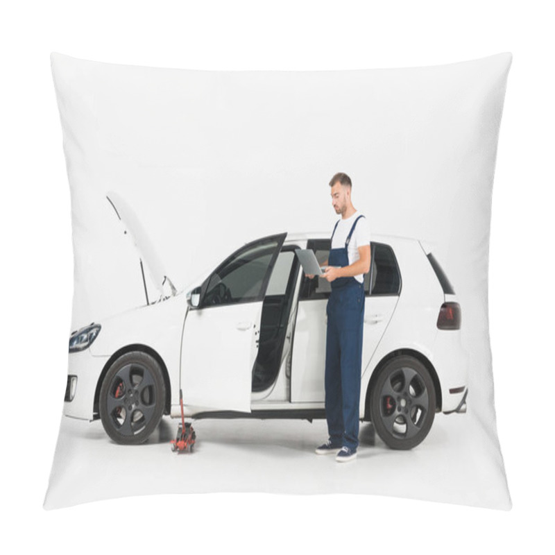 Personality  Handsome Auto Mechanic In Blue Uniform Using Laptop Near Broken Car On White Pillow Covers