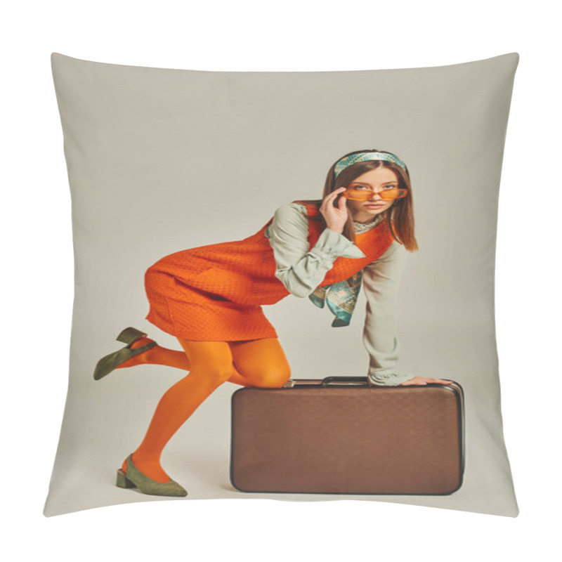 Personality  Glamour Woman In Retro Clothes Adjusting Trendy Sunglasses And Posing Near Vintage Suitcase On Grey Pillow Covers