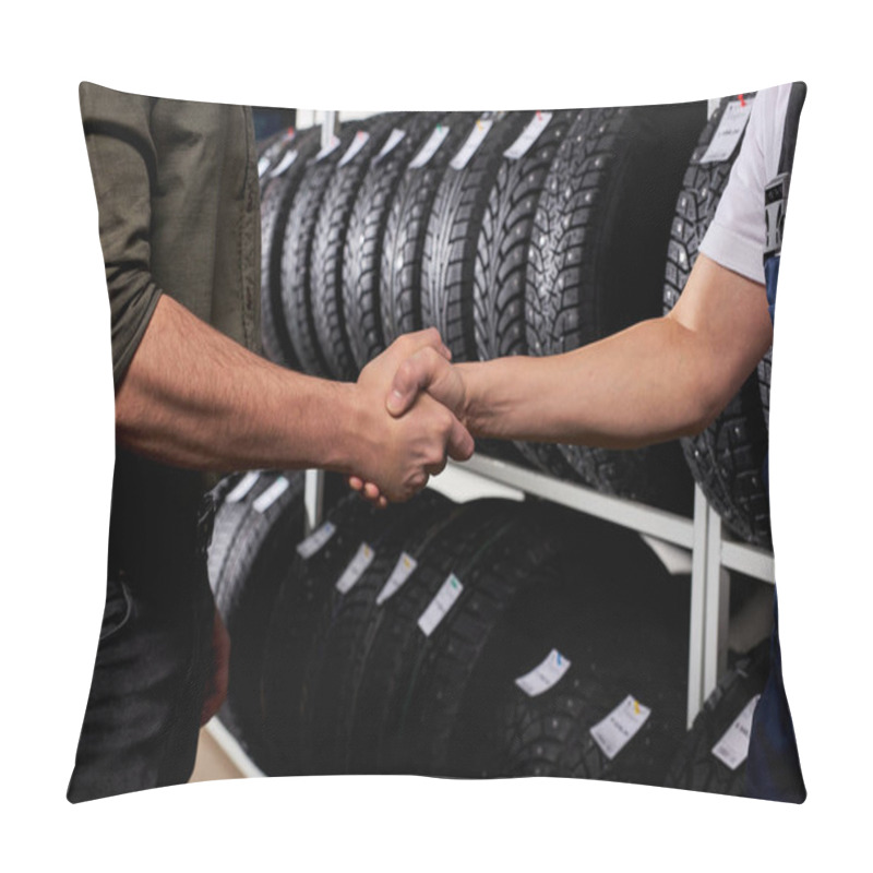 Personality  Cropped Customer And Salesman Shaking Hands Against The Background Of Car Tires Pillow Covers