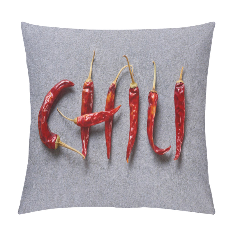 Personality  Top View Of Dried Chili Peppers Arranged In Chili Lettering On Grey Tabletop Pillow Covers