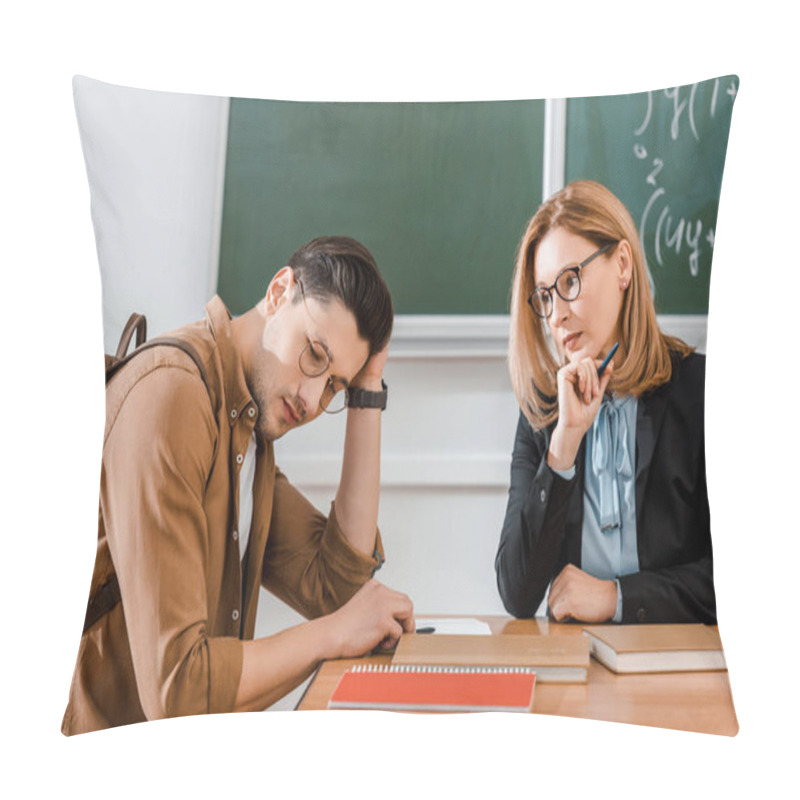 Personality  Young Student Sitting With Backpack Near Female Teacher And Holding Head  Pillow Covers