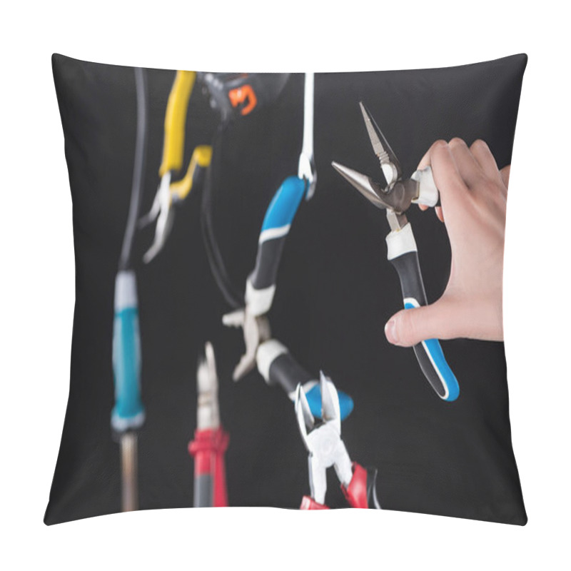 Personality  Cropped View Of Man Holding Pliers With Levitating In Air Tools Isolated On Black Pillow Covers