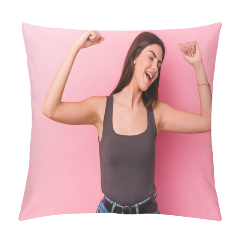 Personality  Young Caucasian Woman Isolated On Pink Background Raising Fist After A Victory, Winner Concept. Pillow Covers