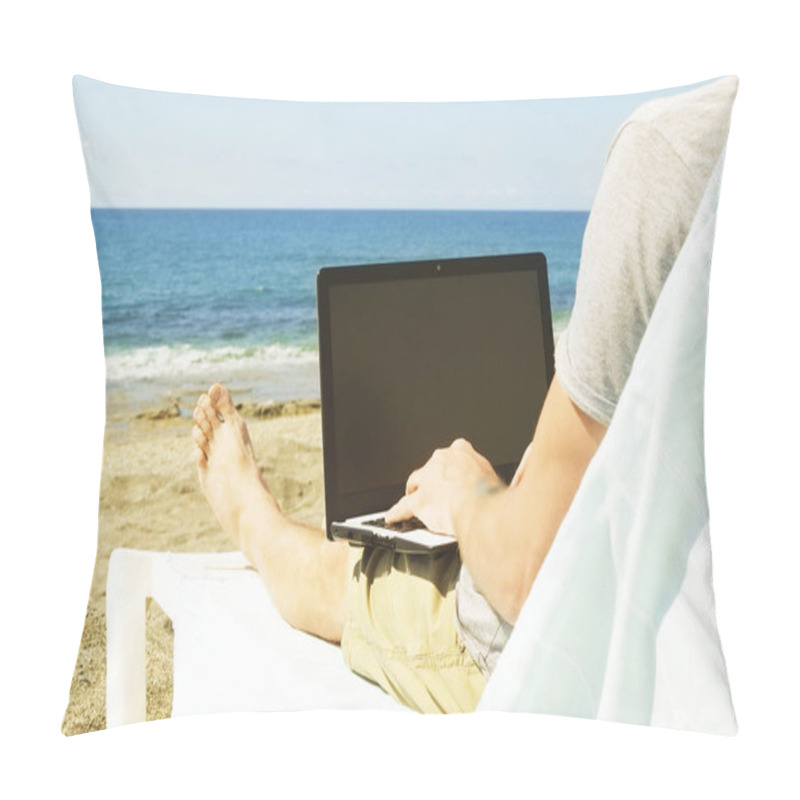 Personality  Young Man In Grey Shirt Sitting At The Beach, Working On Laptop. Blogger, Writer, Coder, Remote Worker Surfing Browsing Researching On Notebook. Wireless Internet On Sea Shore. Background, Copy Space Pillow Covers