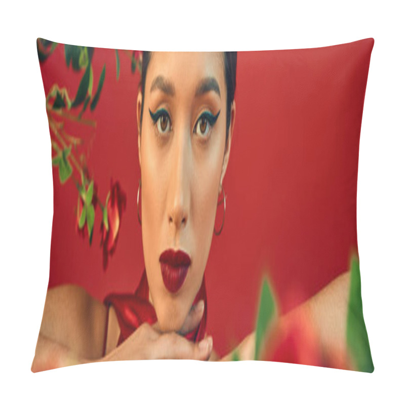 Personality  Portrait Of Youthful And Charming Asian Fashion Model With Bold Makeup And Expressive Gaze Looking At Camera Near Flowers On Red Background, Trendy Spring Concept, Banner Pillow Covers