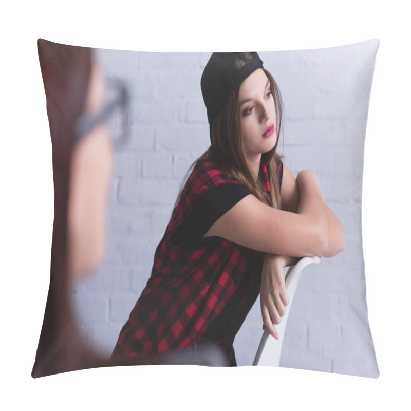 Personality  Sad Teenage Patient In Cap Sitting And Looking Away Near Psychologist On Blurred Foreground  Pillow Covers