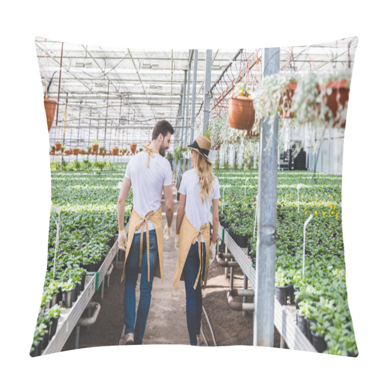 Personality  Man And Woman Gardeners Walking Among Flowers In Greenhouse Pillow Covers