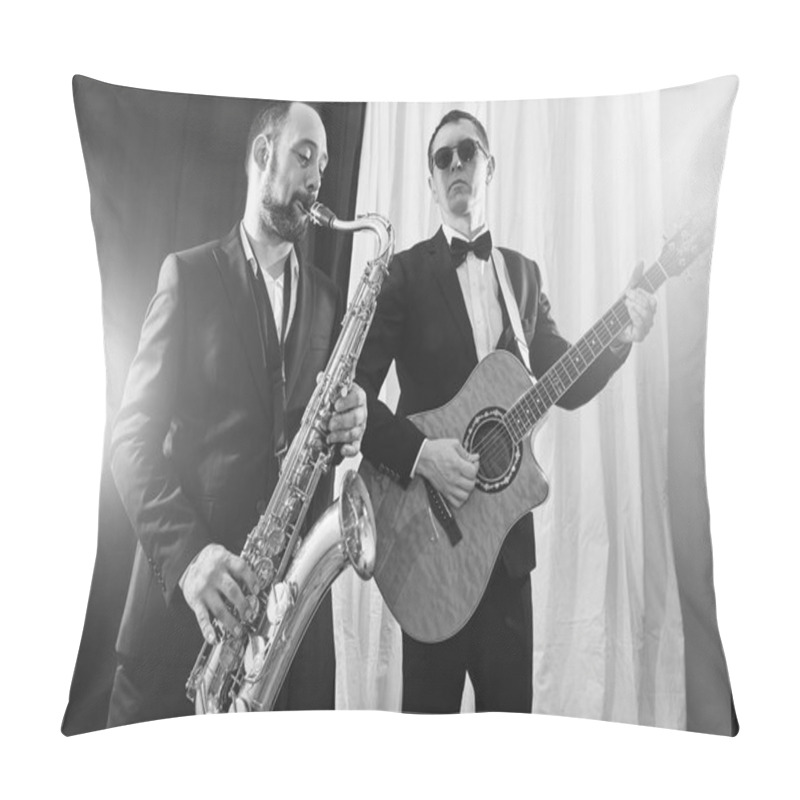 Personality  Group Of Two Musicians, Male Jazz Band, Guitarist And Saxophonist In Classical Costumes Improvise On Musical Instruments In A Studio Black And White Shot Pillow Covers