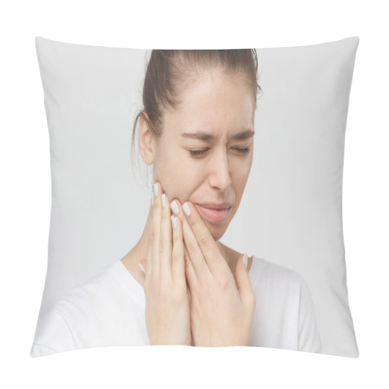 Personality  Closeup Of Beautiful Young Woman Isolated On Grey Background Touching Her Face And Closing Eyes With Expression Of Horrible Suffer From Health Problem And Aching Tooth, Showing Dissatisfaction. Pillow Covers