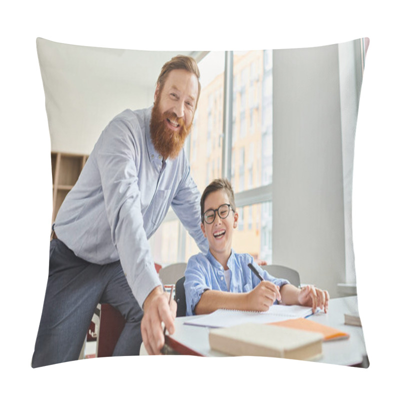 Personality  A Man Standing Next To A Boy At A Desk, Engaged In A Learning Activity In A Vibrant Classroom Setting. Pillow Covers