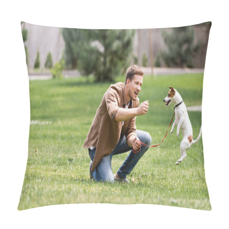 Personality  Selective Focus Of Excited Man Looking At Jumping Jack Russell Terrier In Park Pillow Covers