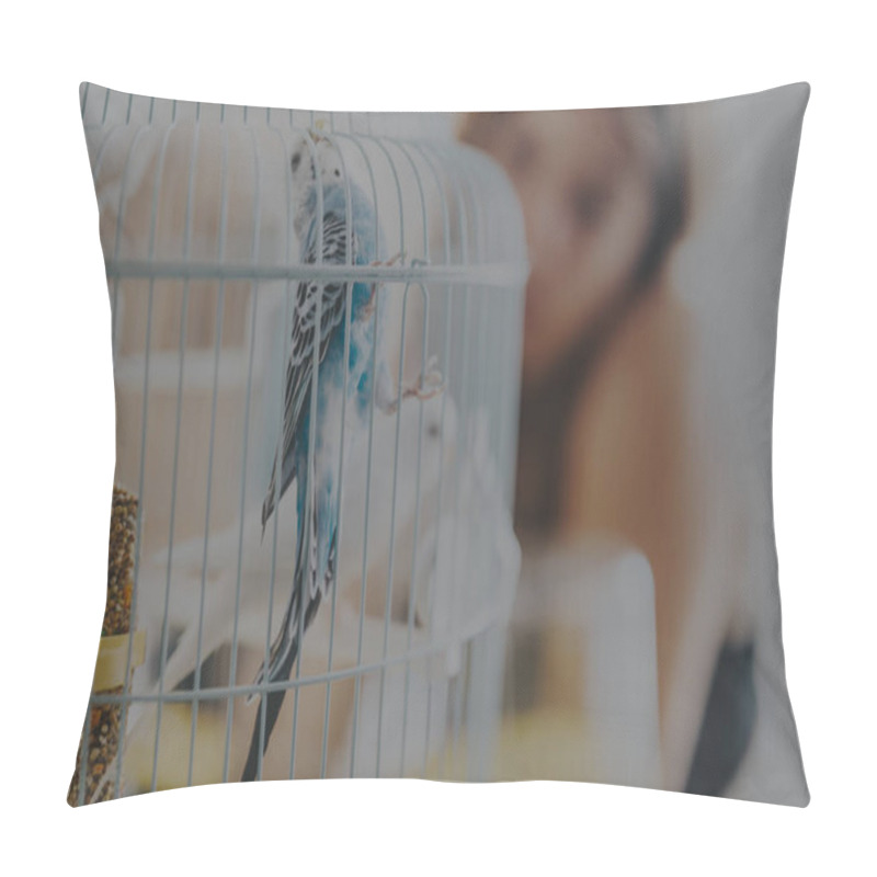 Personality  Blue Parrot Perched Inside A Bird Cage With A Blurred Human Figure In The Background, Illustrating A Domestic Setting And The Companionship Between Pets And People. Pillow Covers