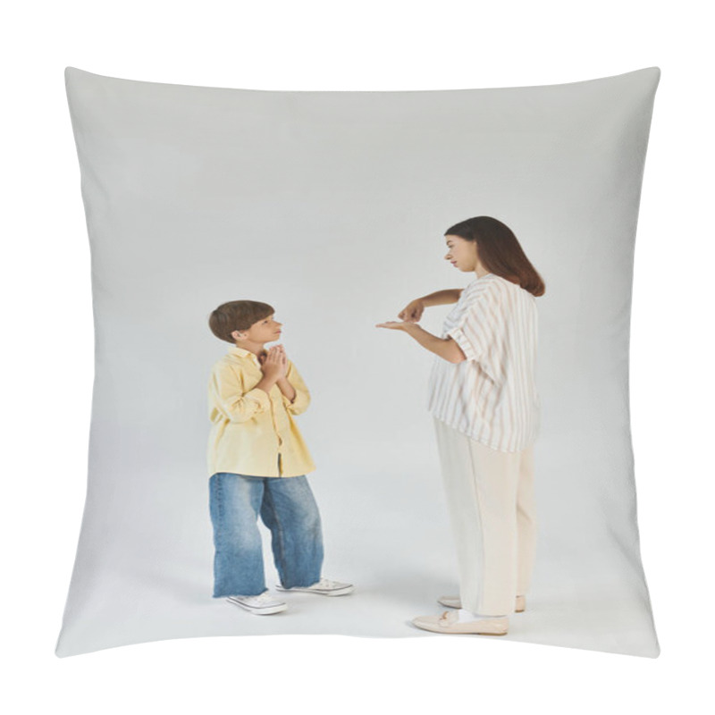 Personality  A Caring Mother Engages With Her Hearing Impaired Son, Fostering Communication And Connection. Pillow Covers