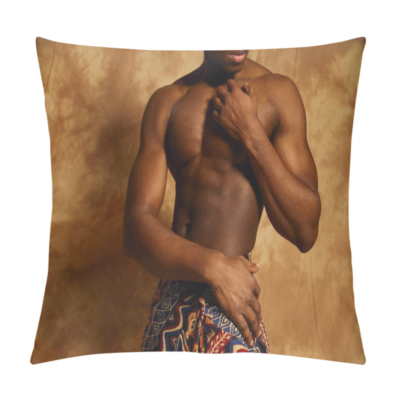 Personality  A Young African American Man Stands Confidently, Posing Topless. He Highlights His Well Defined Physique While Draped Elegantly In Patterned Fabric, Against A Textured Background. Pillow Covers