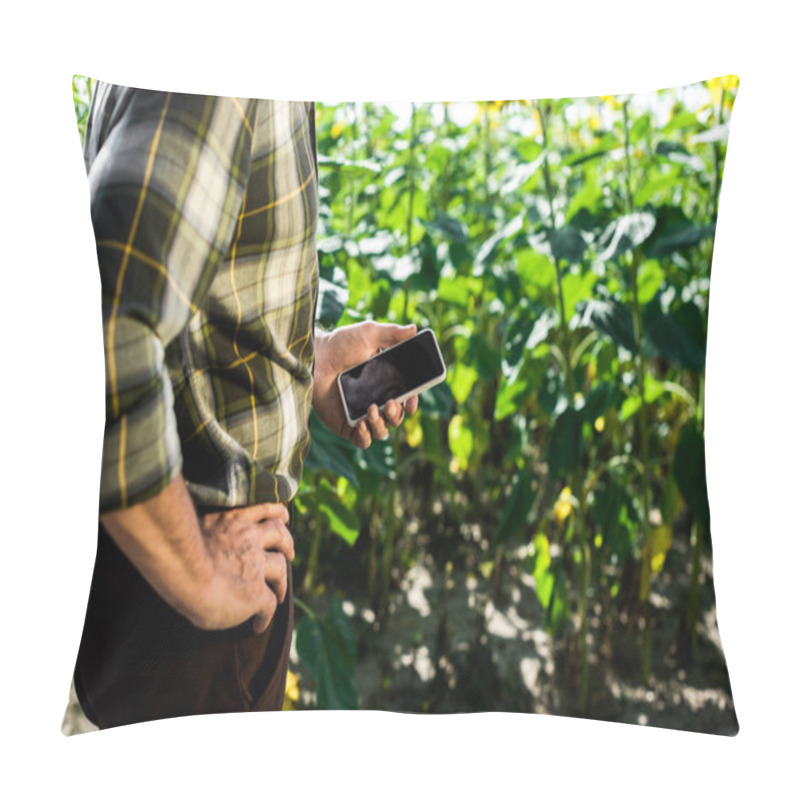 Personality  Cropped View Of Farmer Standing With Hand On Hip And Holding Smartphone With Blank Screen  Pillow Covers