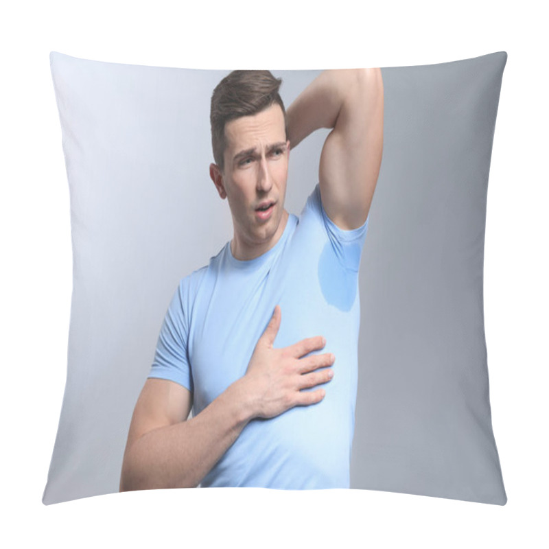 Personality  Young Man With Wet Spot On Clothes Under Armpit Against Grey Background. Concept Of Using Deodorant Pillow Covers