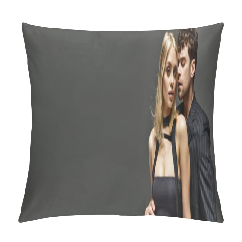 Personality  Handsome Man In Red Designer Attire Posing With Blonde Model On Vibrant Background, Trendy Couple Pillow Covers