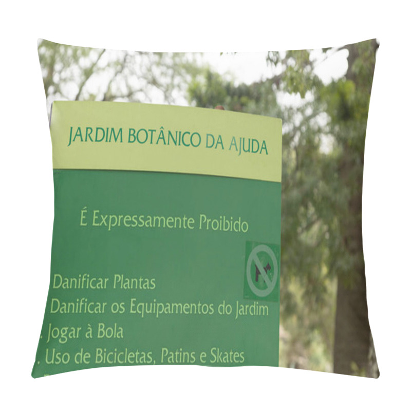 Personality  A Close-up Of A Green Sign At Jardim Botnico Da Ajuda, Lisbon, Displaying Rules For Garden Preservation. Surrounded By Lush Greenery, It Emphasizes Environmental Awareness And Park Regulations. Pillow Covers