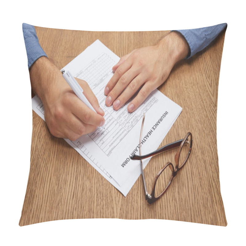 Personality  Close-up Partial View Of Person Signing Insurance Form At Wooden Table   Pillow Covers