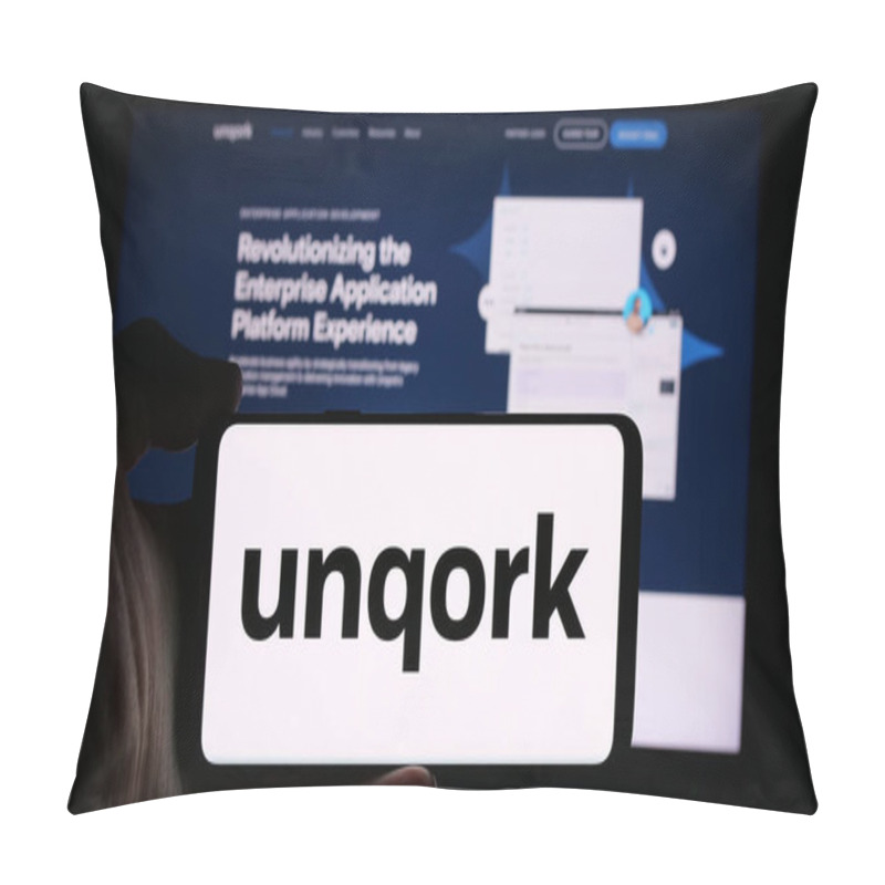 Personality  Stuttgart, Germany - 08-25-2024: Person Holding Cellphone With Logo Of American Enterprise Application Platform Company Unqork Inc. In Front Of Webpage. Focus On Phone Display. Pillow Covers