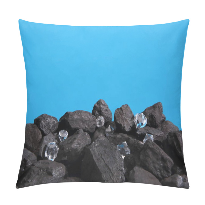 Personality  Close-up Shot Of Diamonds With Pile Of Coal On Blue Pillow Covers