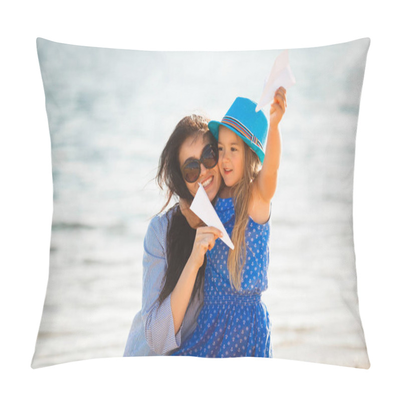 Personality  Young Mother With Daughter Playing With Paper Planes On Beach Pillow Covers