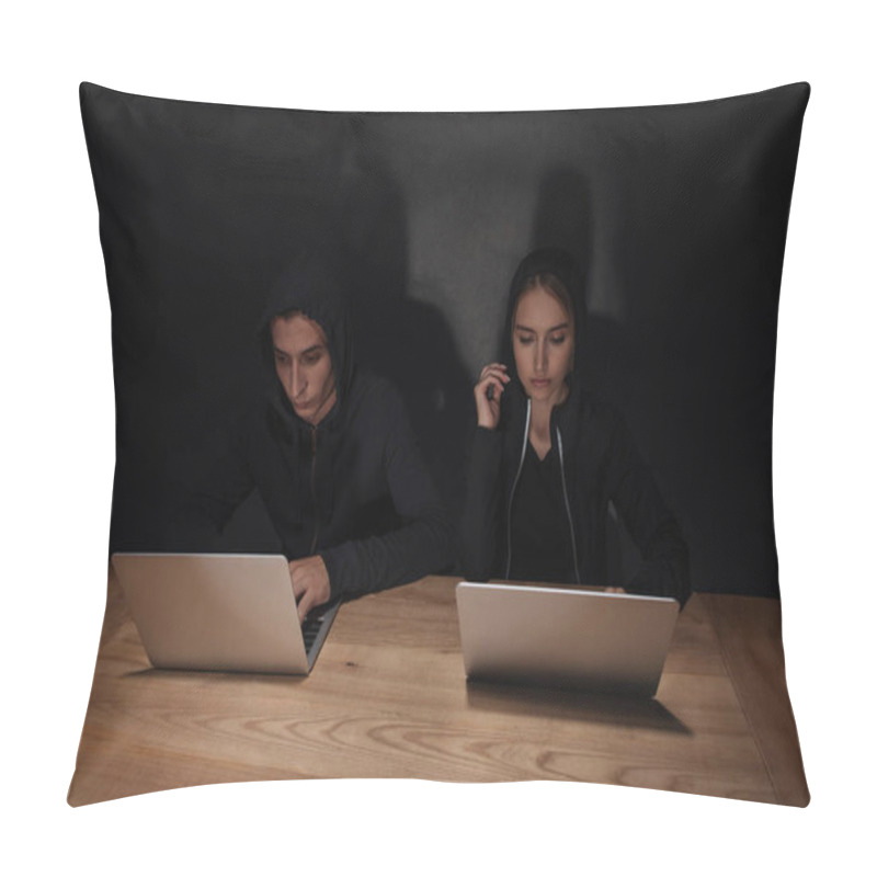 Personality  Hackers In Black Hoodies Using Laptops At Wooden Tabletop In Dark Room, Cyber Security Concept Pillow Covers