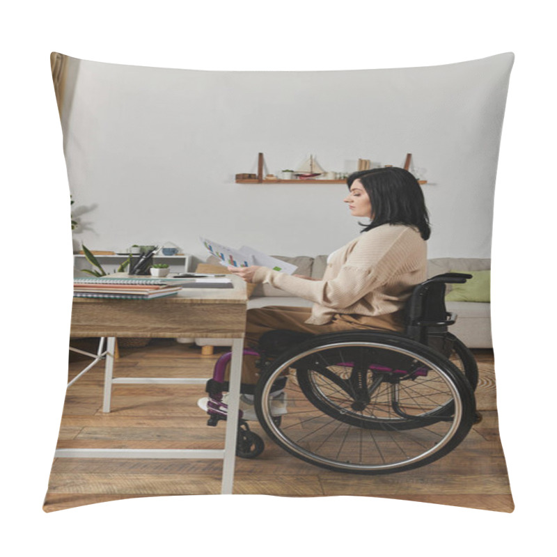 Personality  A Woman In A Wheelchair Sits At A Desk Reviewing Documents, Focusing Intently On The Pages. Pillow Covers