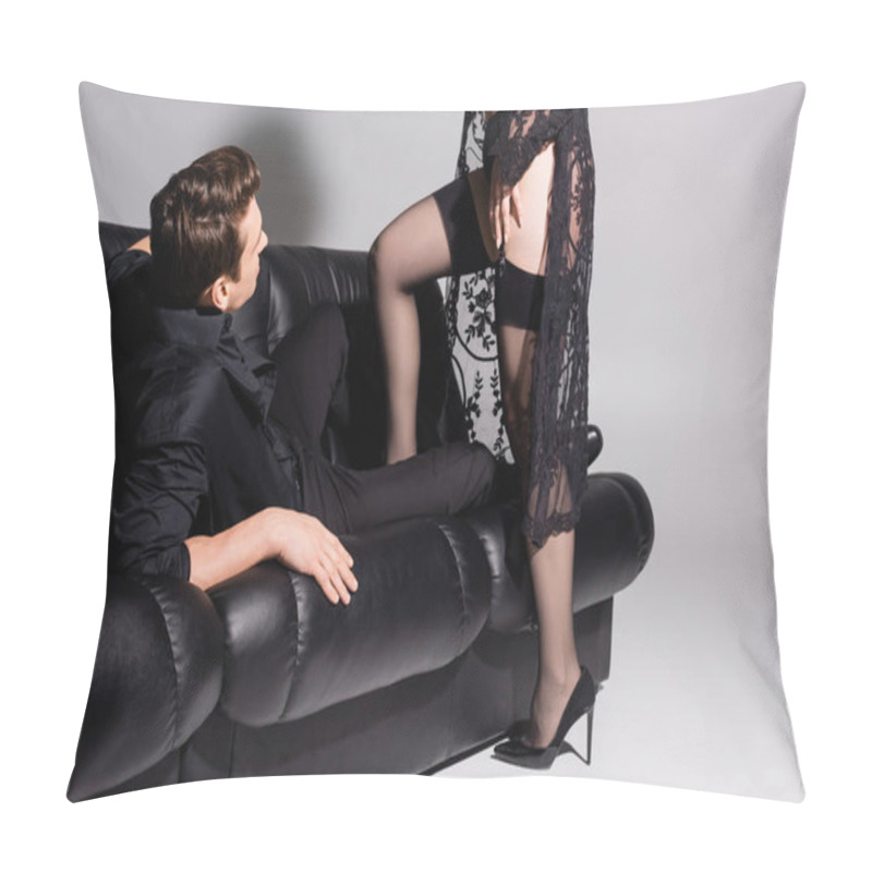 Personality  Sexy Woman In Stockings And Lace Tunic Seducing Man Lying On Leather Couch On Grey Background Pillow Covers