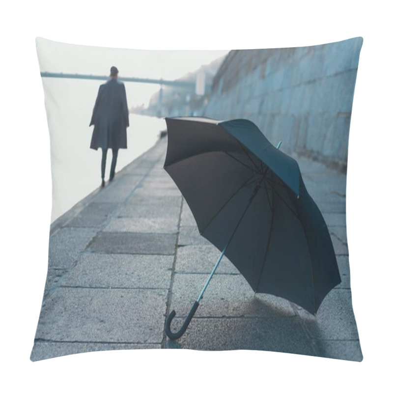 Personality  Umbrella Lying On River Shore While Man Walking Blurred On Background Pillow Covers