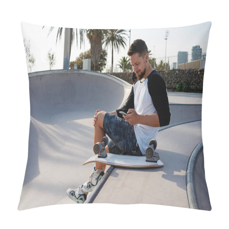 Personality  Young Man Is Holding A Mobile Phone While Sitting In A Skate Zone. A Guy Is Surfing The Web By The Smartphone While Sitting On A Sunset Background Pillow Covers