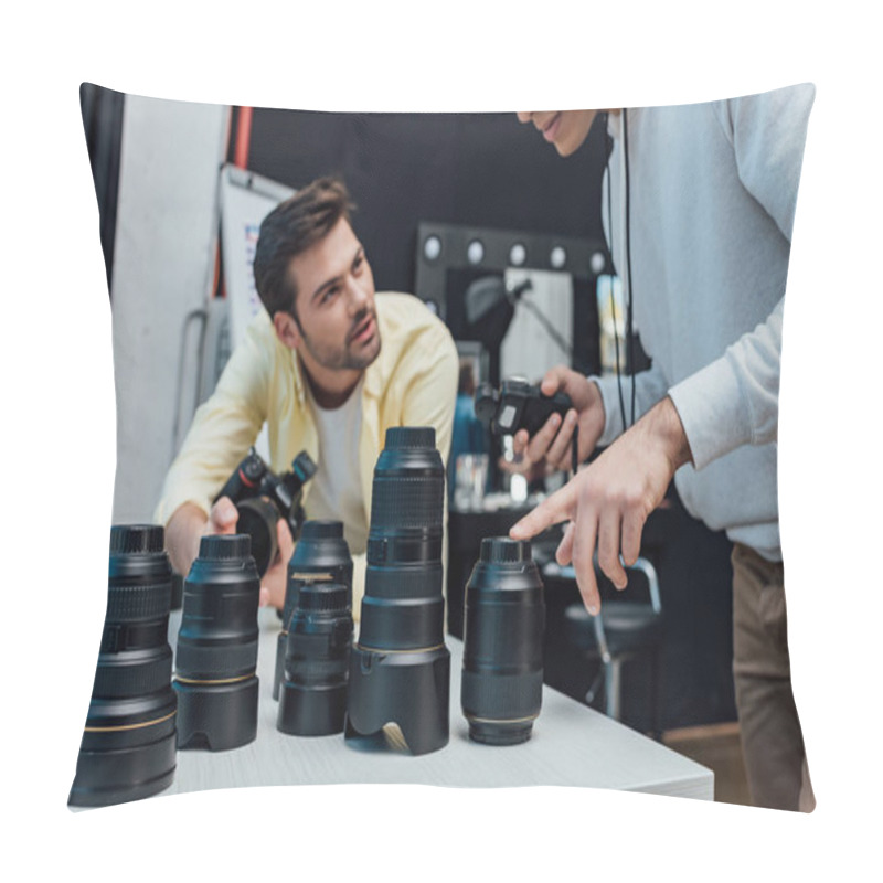 Personality  Cropped View Of Art Director Pointing With Finger At Camera Lens Near Photographer  Pillow Covers