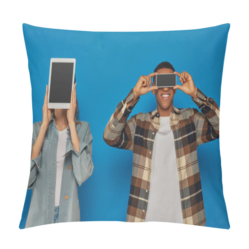 Personality  Interracial Couple Holding Smartphone And Digital Tablet With Blank Screen On Blue Backdrop Pillow Covers