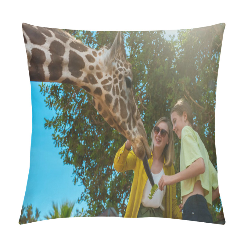 Personality  Woman And Her Daughter Feeding Giraffe In Zoo. Pillow Covers