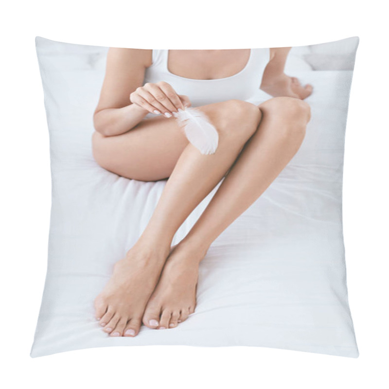 Personality  Leg Skin. Woman Touching Legs With Soft Skin With White Feather Pillow Covers