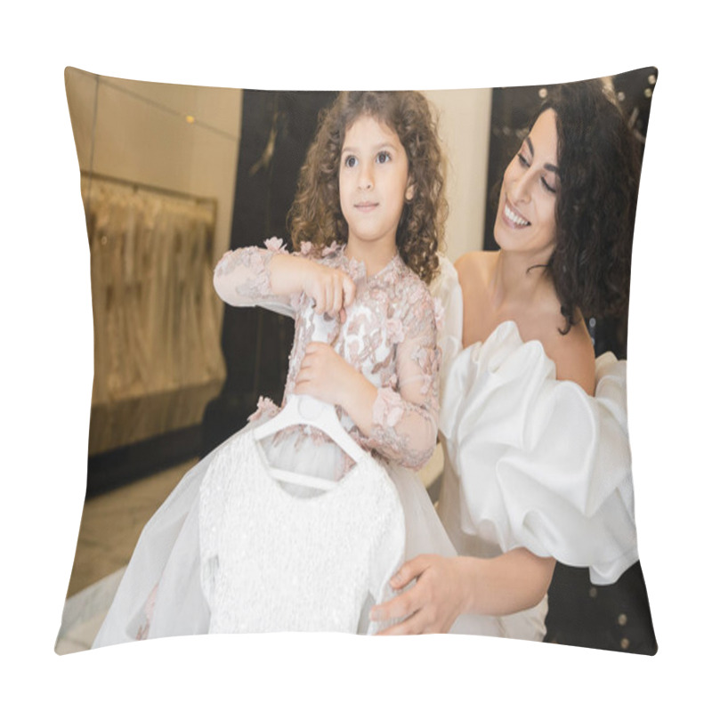 Personality  Charming Middle Eastern Bride With Brunette Hair Standing In White Wedding Gown With Puff Sleeves And Ruffles Looking At Cute Daughter Holding Girly Dress With Tulle Skirt In Bridal Boutique   Pillow Covers