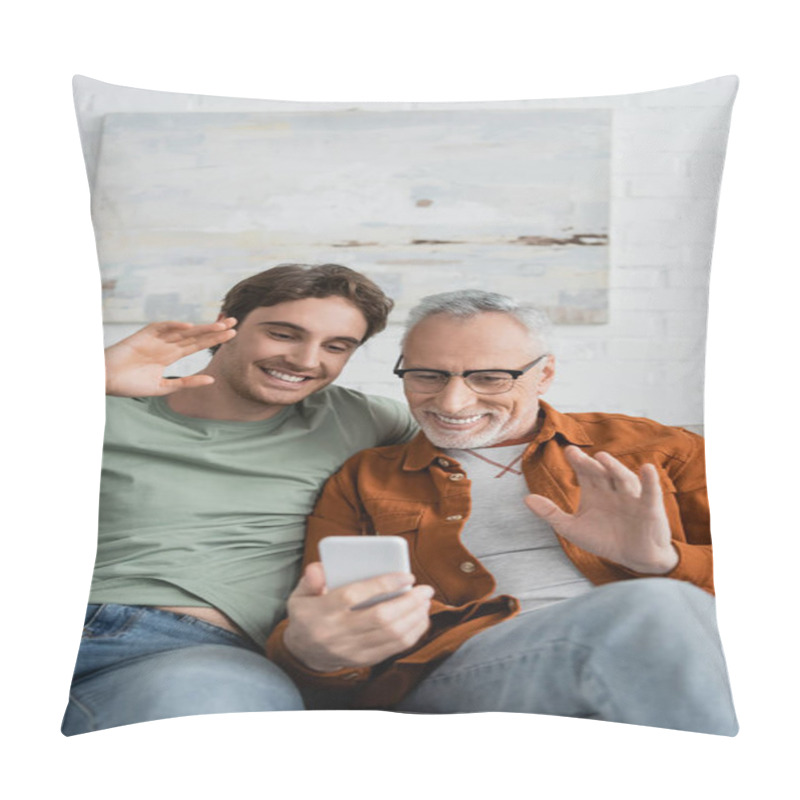 Personality  Happy Mature Man And Cheerful Son Waving Hands During Video Call On Smartphone  Pillow Covers