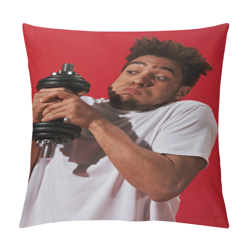 Personality  Young African American Man Working Out With Heavy Dumbbell And Puffing Cheeks On Red Background Pillow Covers