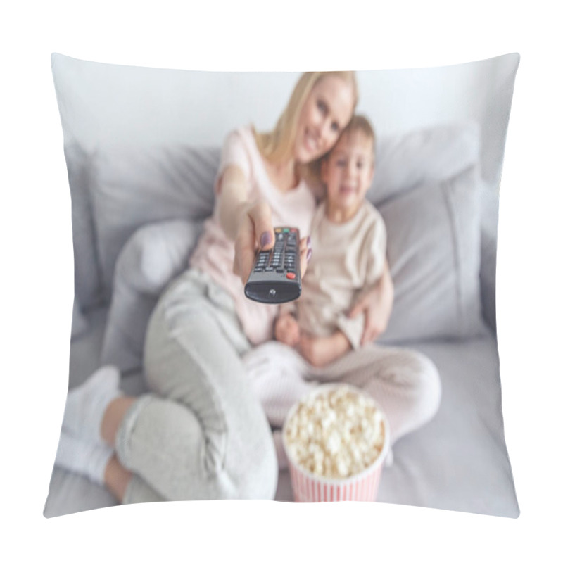 Personality  Close-up Shot Of Mother And Son Using Remote Control For Tv Pillow Covers