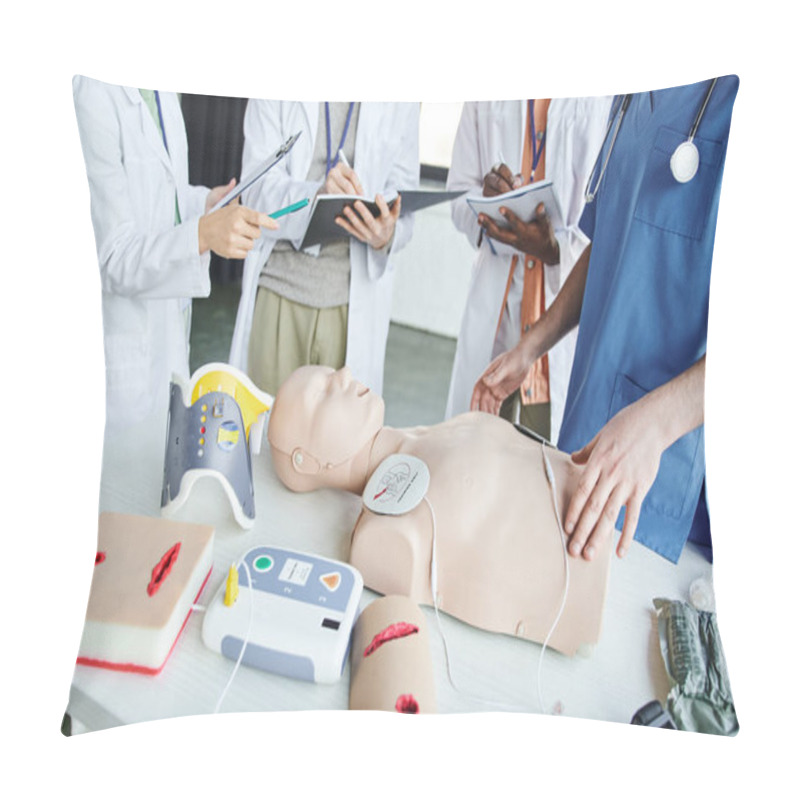 Personality  Cropped View Of Woman In White Coat Pointing At CPR Manikin And Defibrillator Near Paramedic And Multiethnic Students Writing In Notebooks, Life-saving Skills Hands-on Learning Concept Pillow Covers