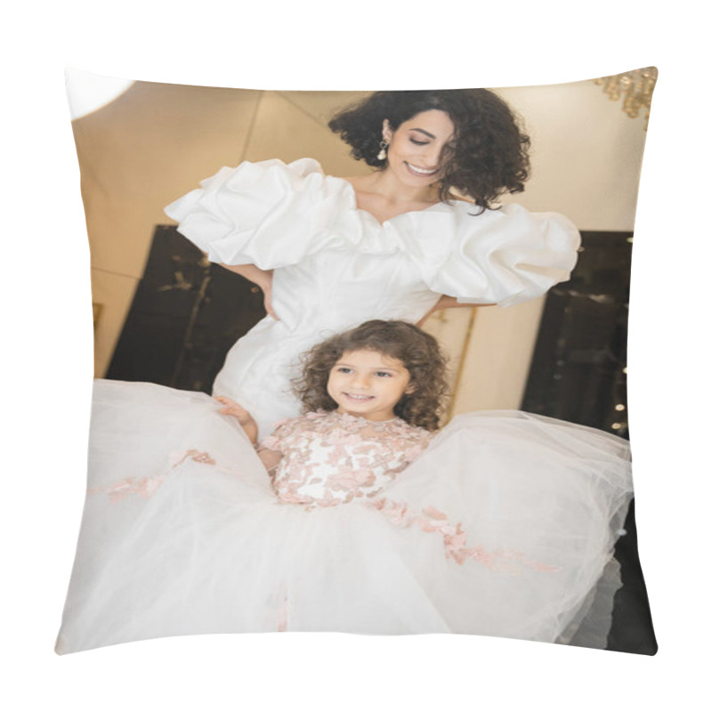 Personality  Happy Little Girl In Floral Attire Holding Tulle Skirt And Looking Away Near  Middle Eastern Mother With Wavy Hair Standing In White Wedding Dress With Puff Sleeves And Ruffles In Bridal Boutique  Pillow Covers