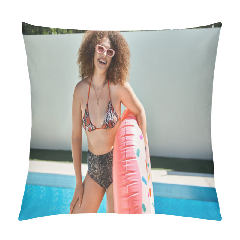 Personality  A Woman With Curly Hair In A Bikini Smiles At The Camera While Holding A Pink Donut Pool Float, Standing By A Pool. Pillow Covers