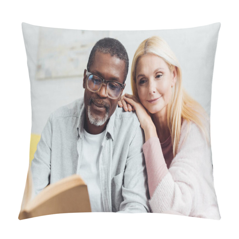 Personality  African American Man In Glasses And Blonde Mature Woman Reading Book Together  Pillow Covers