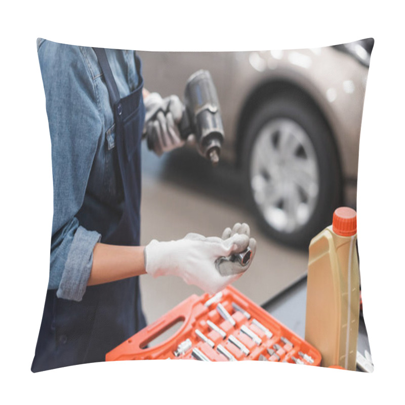 Personality  Partial View Of Young Mechanic Hands In Gloves Holding Electric Screwdriver And Attachment Near Toolbox In Auto Repair Service Pillow Covers