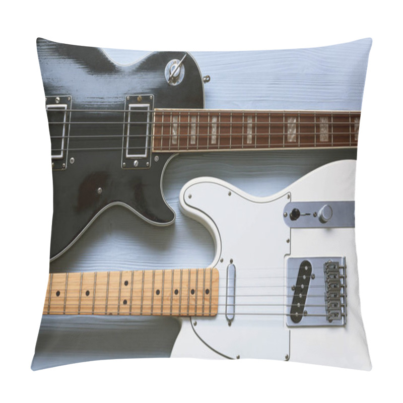 Personality  Two Guitars On A Light Wooden Board. Pillow Covers