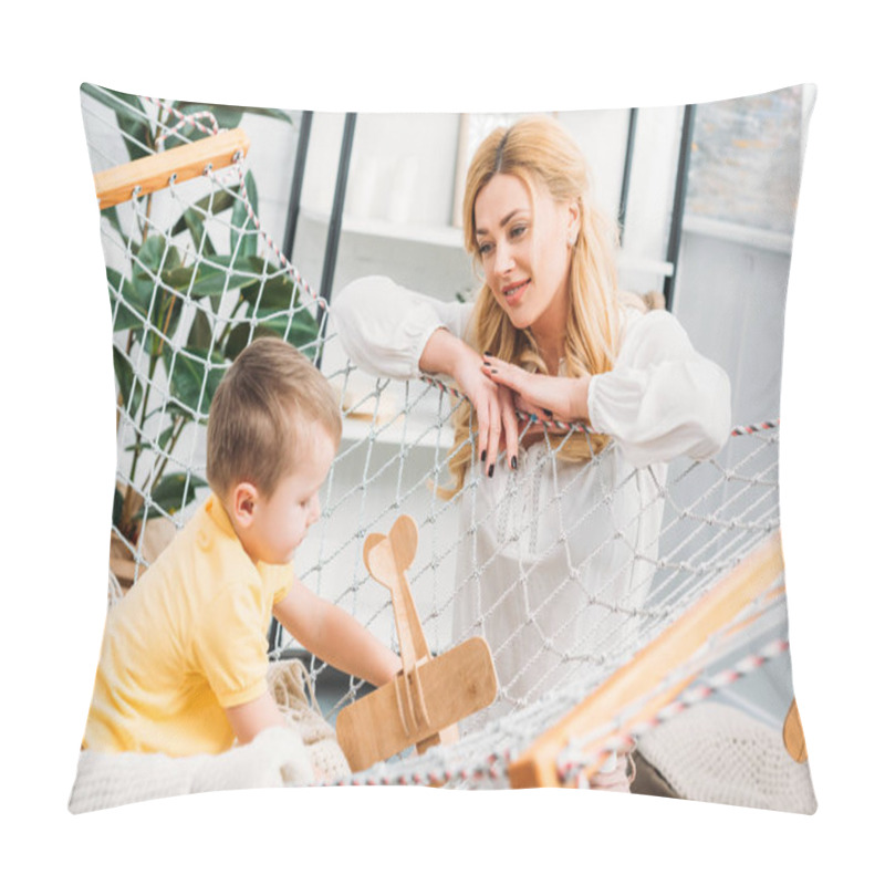 Personality  Mother Watching Little Boy Playing With Wooden Airplane Toy  Pillow Covers