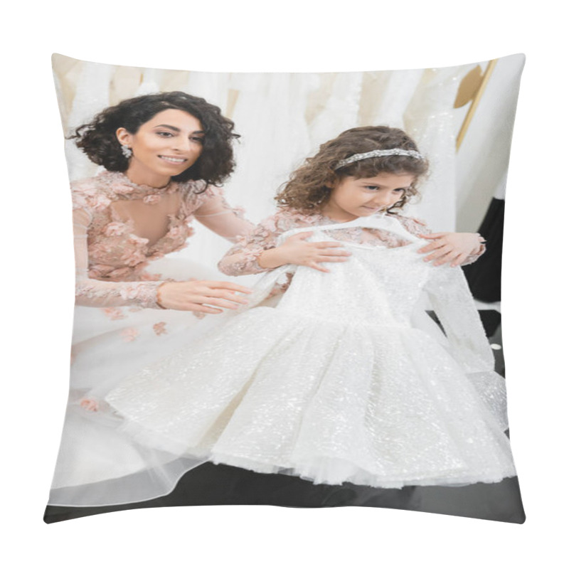 Personality  Happy And Brunette Middle Eastern Bride In Floral Wedding Gown Helping To Choose Dress For Her Little Daughter In Bridal Salon Around White Tulle Fabrics, Process Of Preparation  Pillow Covers