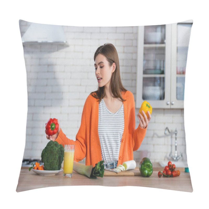 Personality  Young Woman Holding Fresh Bell Pepper Near Vegetables And Juice On Kitchen Counter Pillow Covers